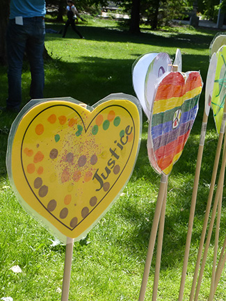 Homemade paper hearts with various messages