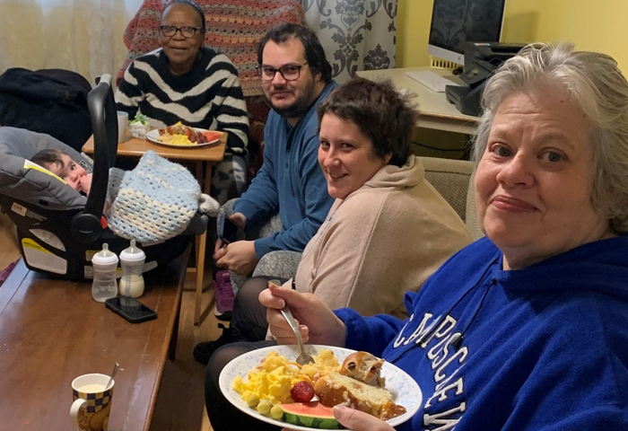 A multigenerational family eating together