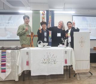 Reverend Kim Susannah and members of the congregation welcome Emily Dwyer