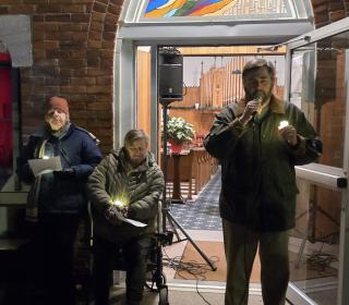 Brian Ostrander, Mayor of Brighton, Ontario, speaks at the vigil