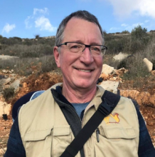 A photograph of Keith Simmonds in his Ecumenical Accompanier vest.