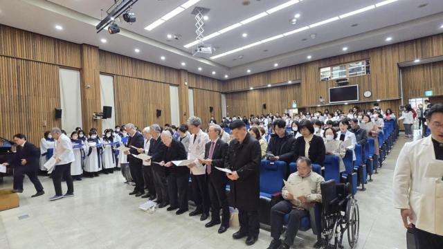 Dr. Margaret Storey being honoured in a special worship service in Korea..