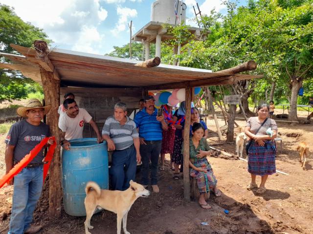 Locals watch as a solar well is installed in their village in Guatemala