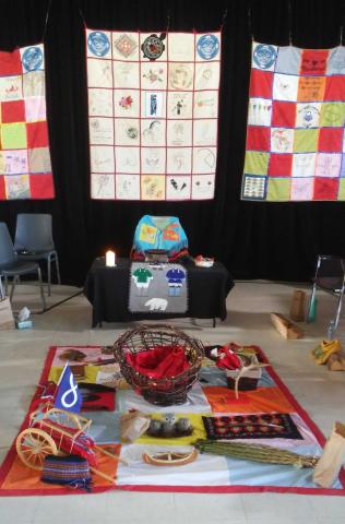 An altar at the Missing and Murdered Indigenous Women and Girls hearing in Maliotenam, Quebec.