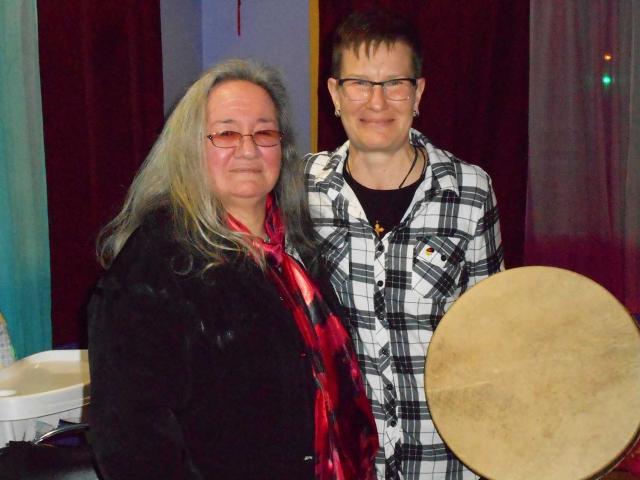 Moderator Jordan Cantwell (right) and Agnes Spence (left) from Nelson House, Manitoba with the drum she made for The Moderator.