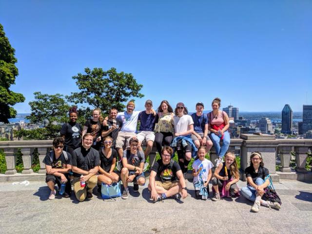 The GC43 Pilgrims gather for a group photo atop Mount Royal, overlooking downtown Montreal.