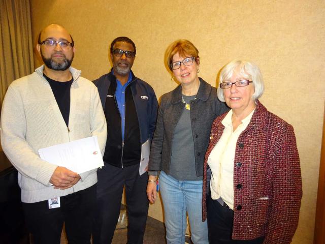 Representatives from the Muslim prayer group and General Council Office staff.