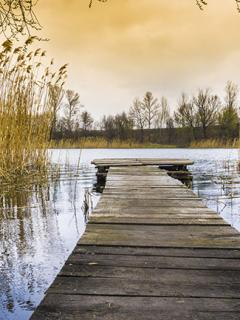 Dock in the water at dusk